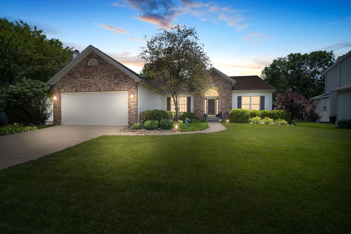 3205 Stonebridge Drive Bloomington, IL 61704 - Photo 37 of 37 a front view of house with yard and green space