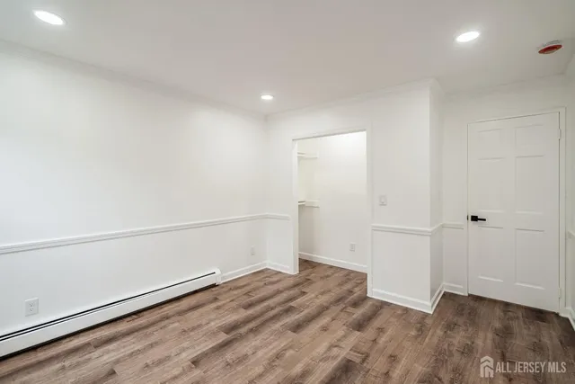 a bathroom with a sink a toilet and vanity