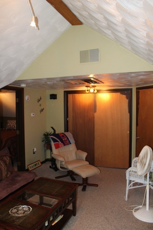 18-20 Howes Street Springfield, MA 01118 - Photo 22 of 30 a living room with furniture and air conditioner vent