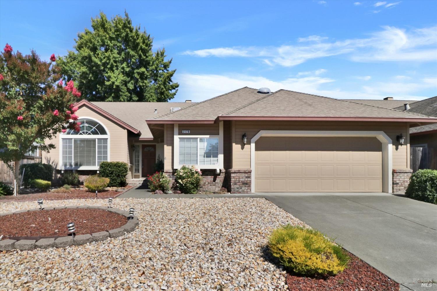 2170 Erika Street Santa Rosa, CA 95403 - Photo 1 of 1 a front view of a house with a yard and potted plants
