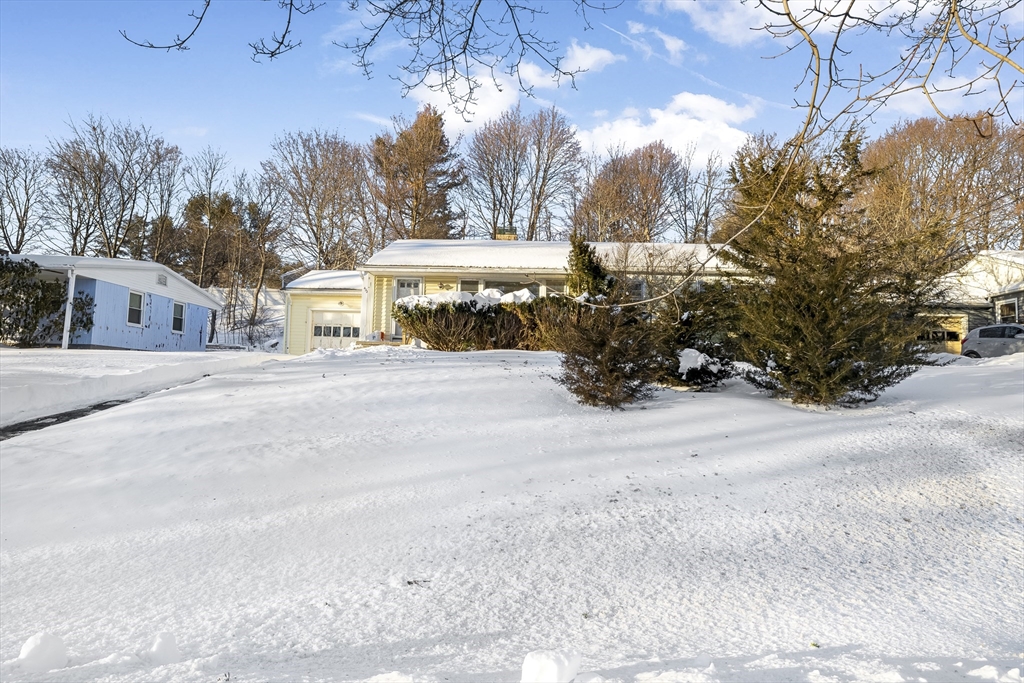 432 Mower Street Worcester, MA 01602 - Photo 16 of 16 a view of a house with a snow in the yard