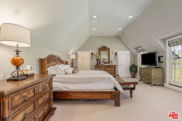 a bathroom with a granite countertop sink a mirror and a shower