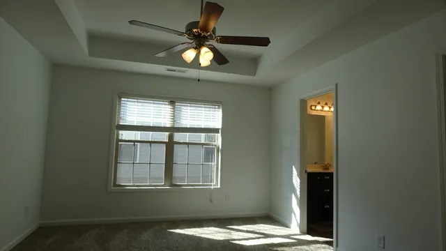 a view of a yard covered in snow