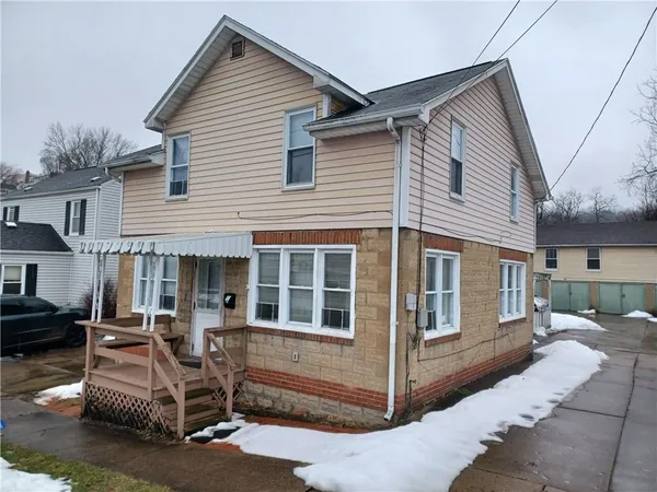 a view of a house with a patio