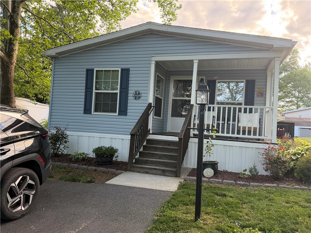 12 Springridge Road Bath, PA 18014 - Photo 32 of 61 A charming compact home with a welcoming covered front porch, perfect for enjoying quiet mornings.