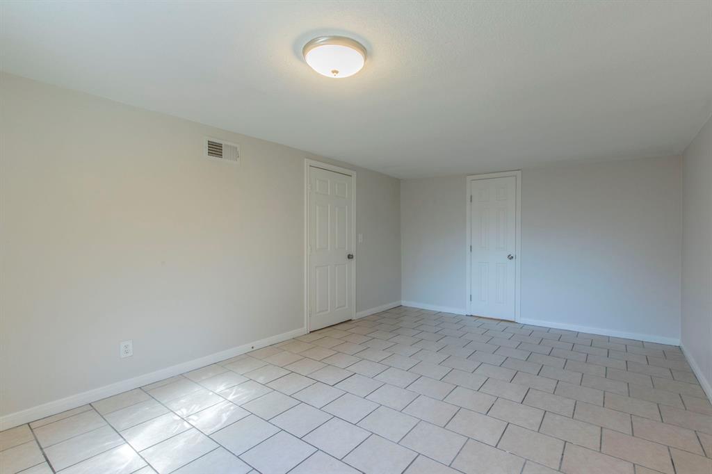 1029 North New Road Waco, TX 76710 - Photo 16 of 26 a view of an empty room and window
