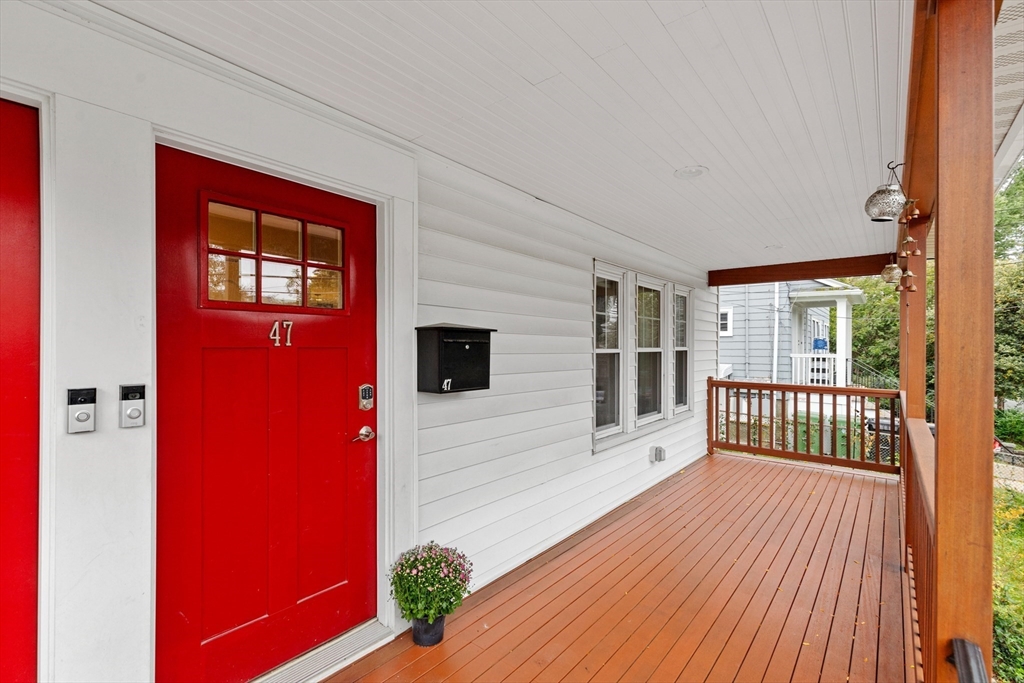 47 Fuller Road, Unit 47 Watertown, MA 02472 - Photo 2 of 21 a view of a porch with wooden floor