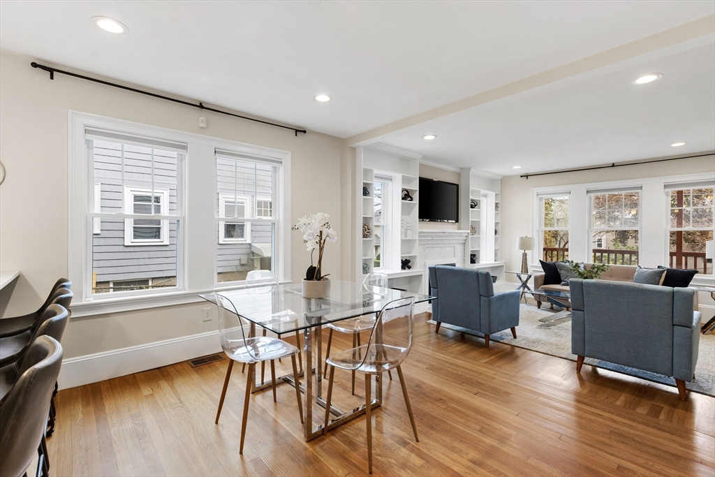 47 Fuller Road, Unit 47 Watertown, MA 02472 - Photo 6 of 21 a view of a dining room with furniture and wooden floor