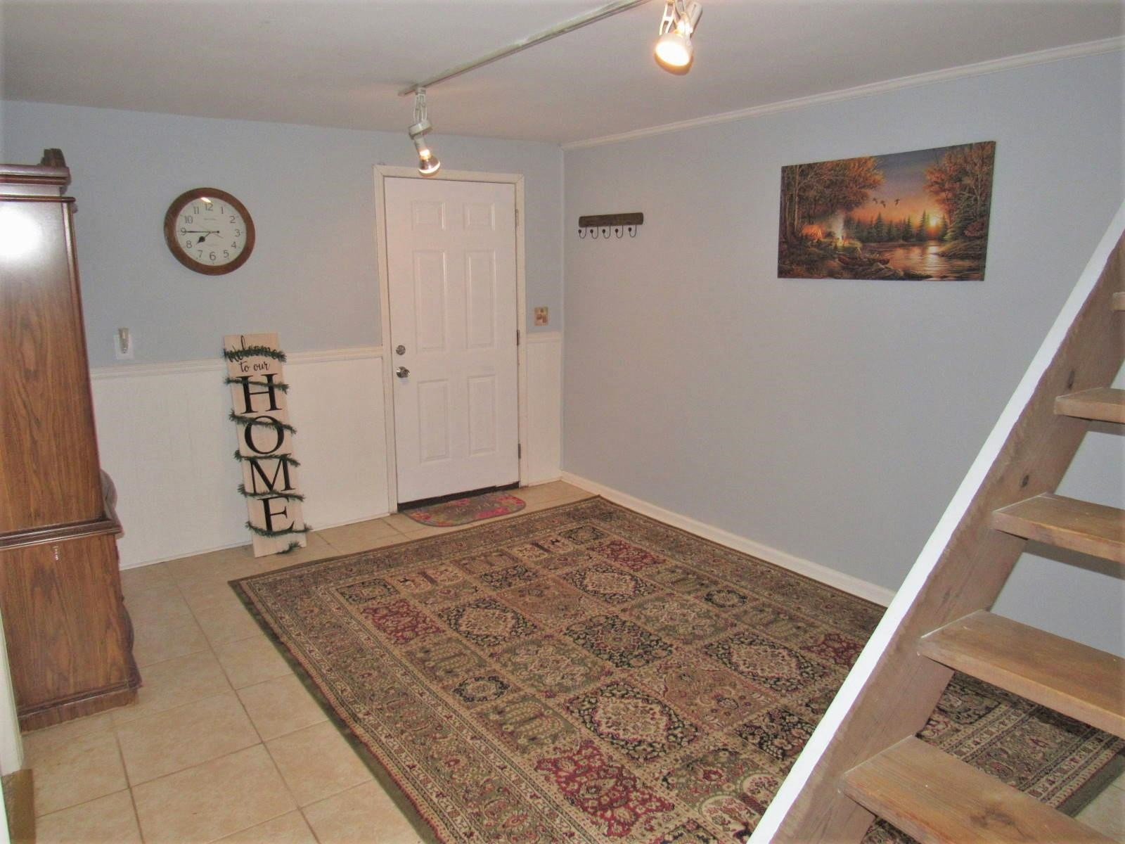 306 Waters Edge Loop Henderson, NC 27537 - Photo 25 of 35 a view of a hallway with closet