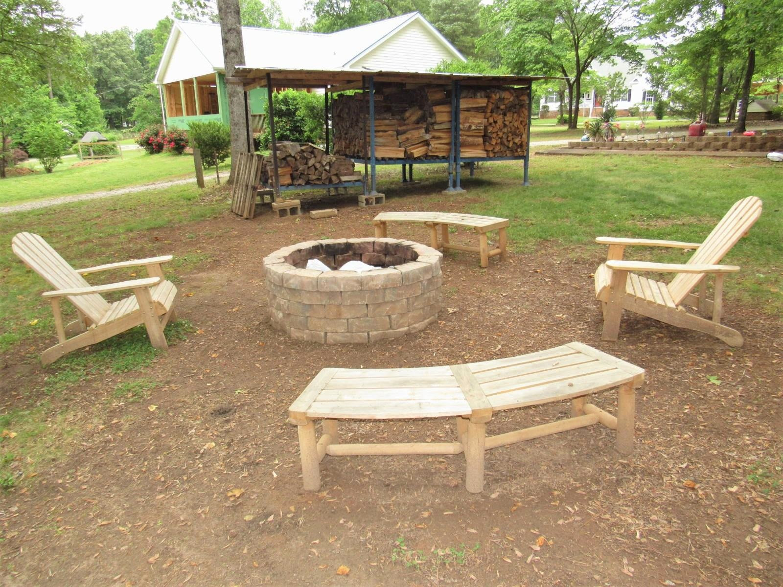 306 Waters Edge Loop Henderson, NC 27537 - Photo 29 of 35 a view of a backyard with sitting area