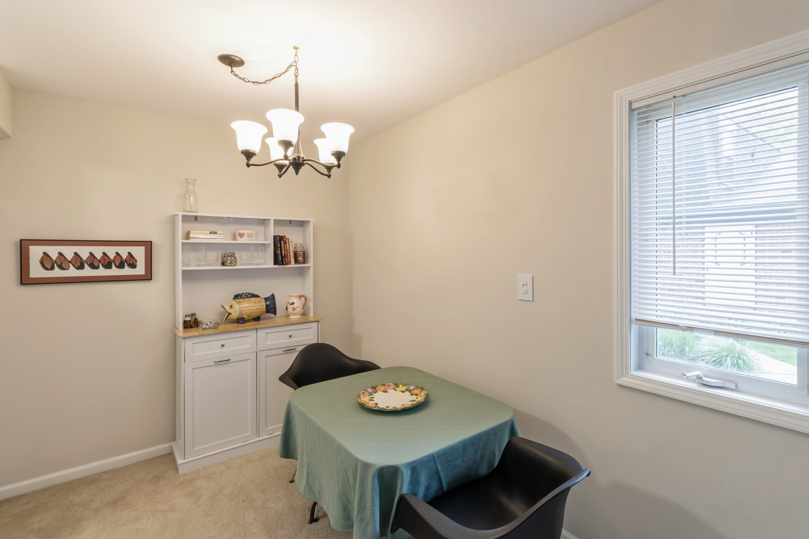 258 Inverrary Lane Deerfield, IL 60015 - Photo 3 of 13 a view of a workspace with furniture and a window