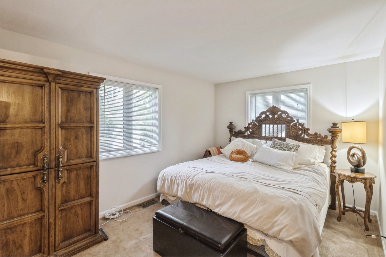 258 Inverrary Lane Deerfield, IL 60015 - Photo 5 of 13 a bedroom with a bed and a window