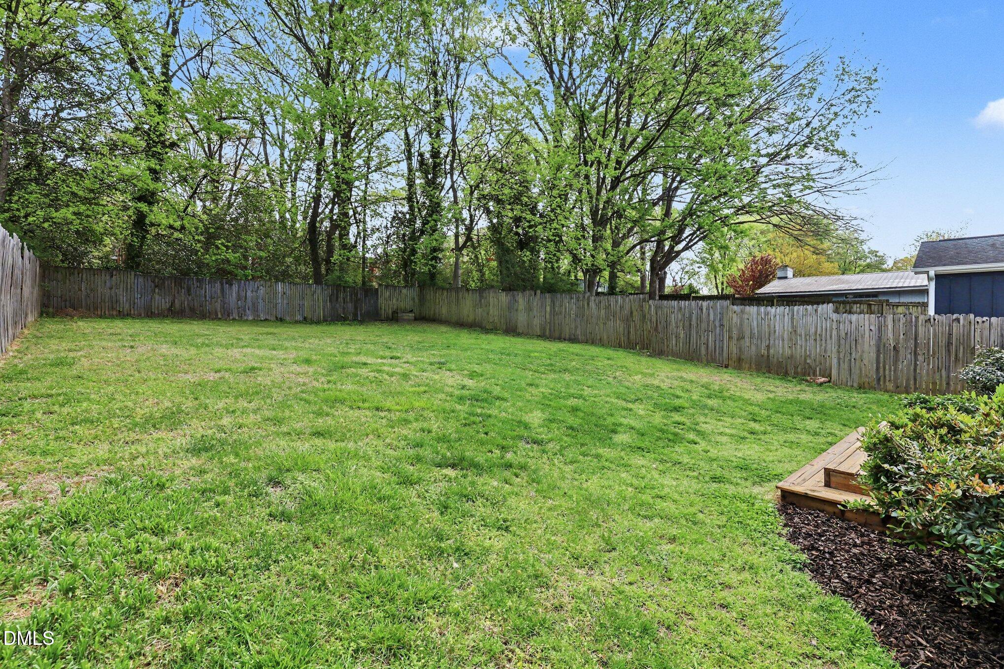 727 South State Street Raleigh, NC 27601 - Photo 23 of 30 a view of a backyard with a garden