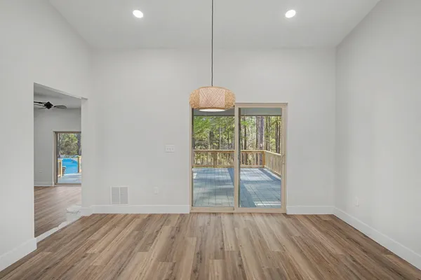 a view of a hallway with a fan