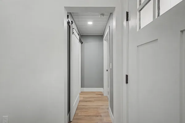 a view of a yard with basketball court