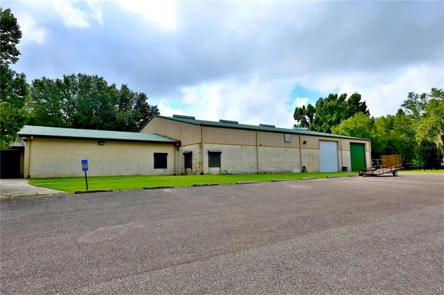 a house view with a backyard space
