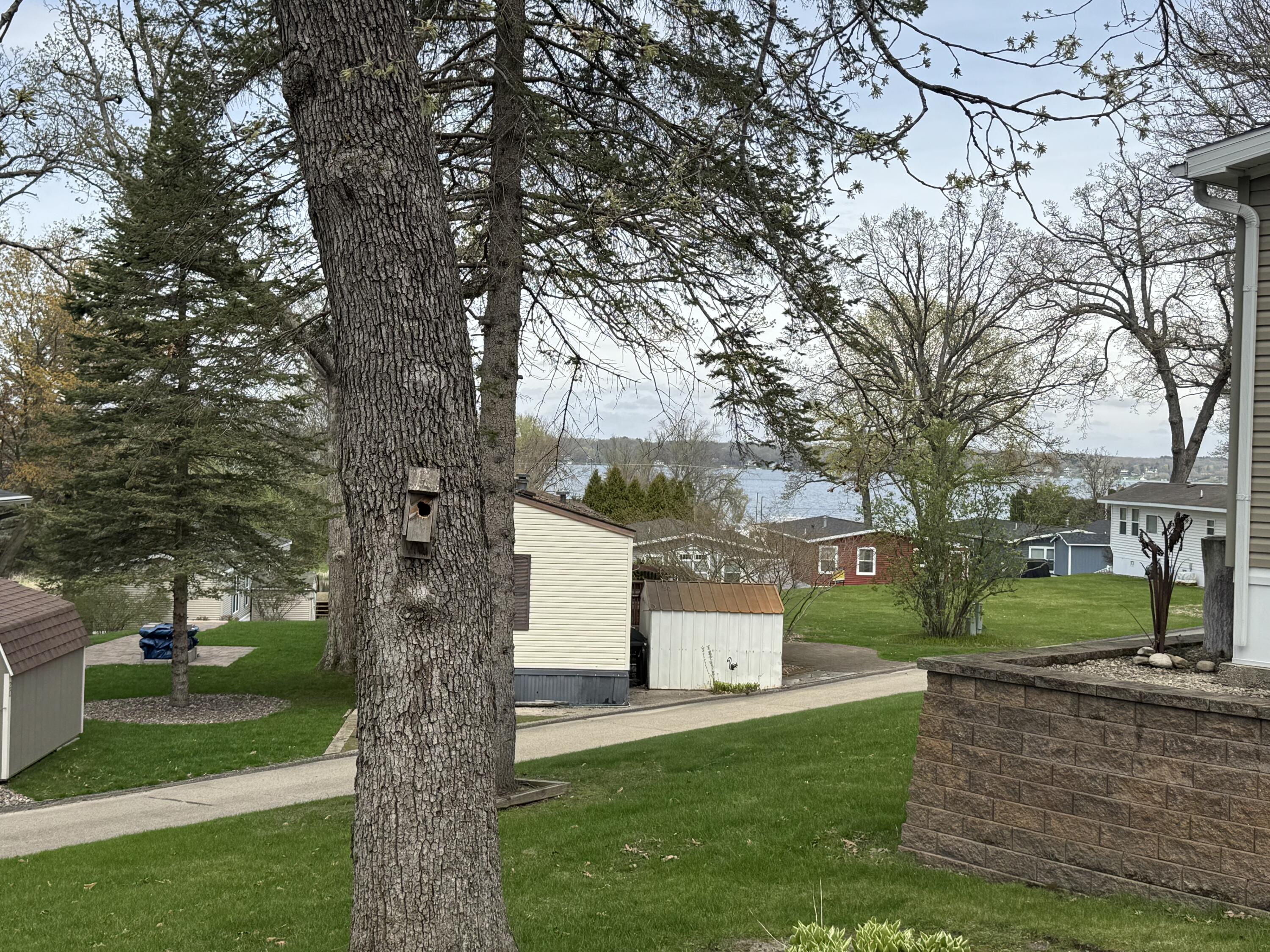 W1325 Spring Grove Road, Unit 39 Ripon, WI 54971 - Photo 19 of 28 Water view from the porch