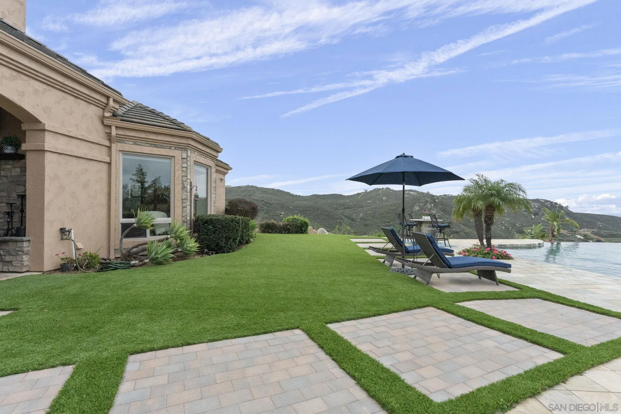 15480 Eastvale Road Poway, CA 92064 - Photo 11 of 71 a view of a backyard with sitting area