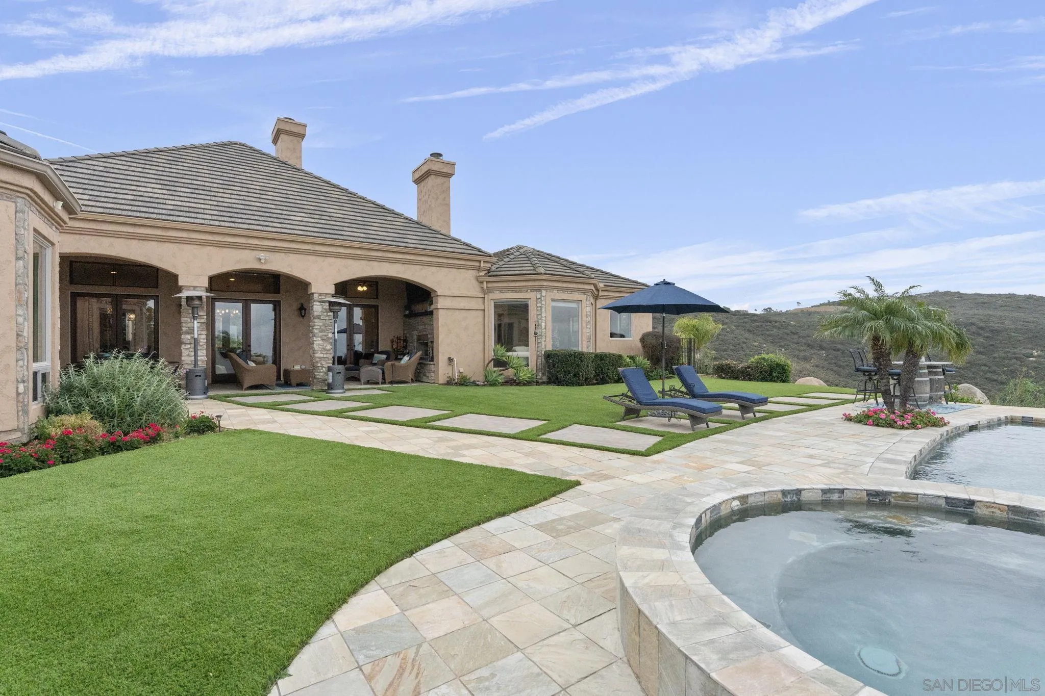 15480 Eastvale Road Poway, CA 92064 - Photo 13 of 71 a front view of house with yard and green space