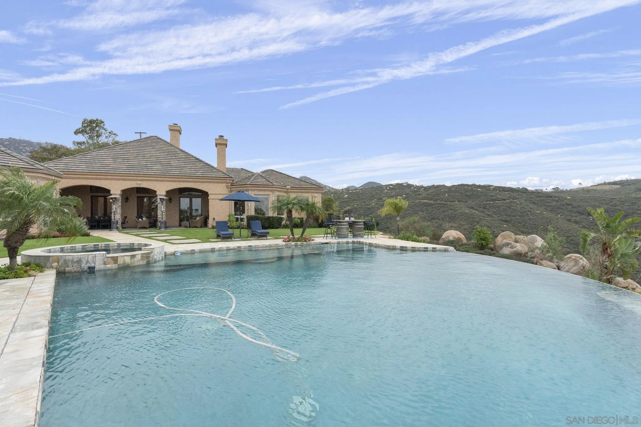 15480 Eastvale Road Poway, CA 92064 - Photo 14 of 71 a view of a lake with a mountain in the background