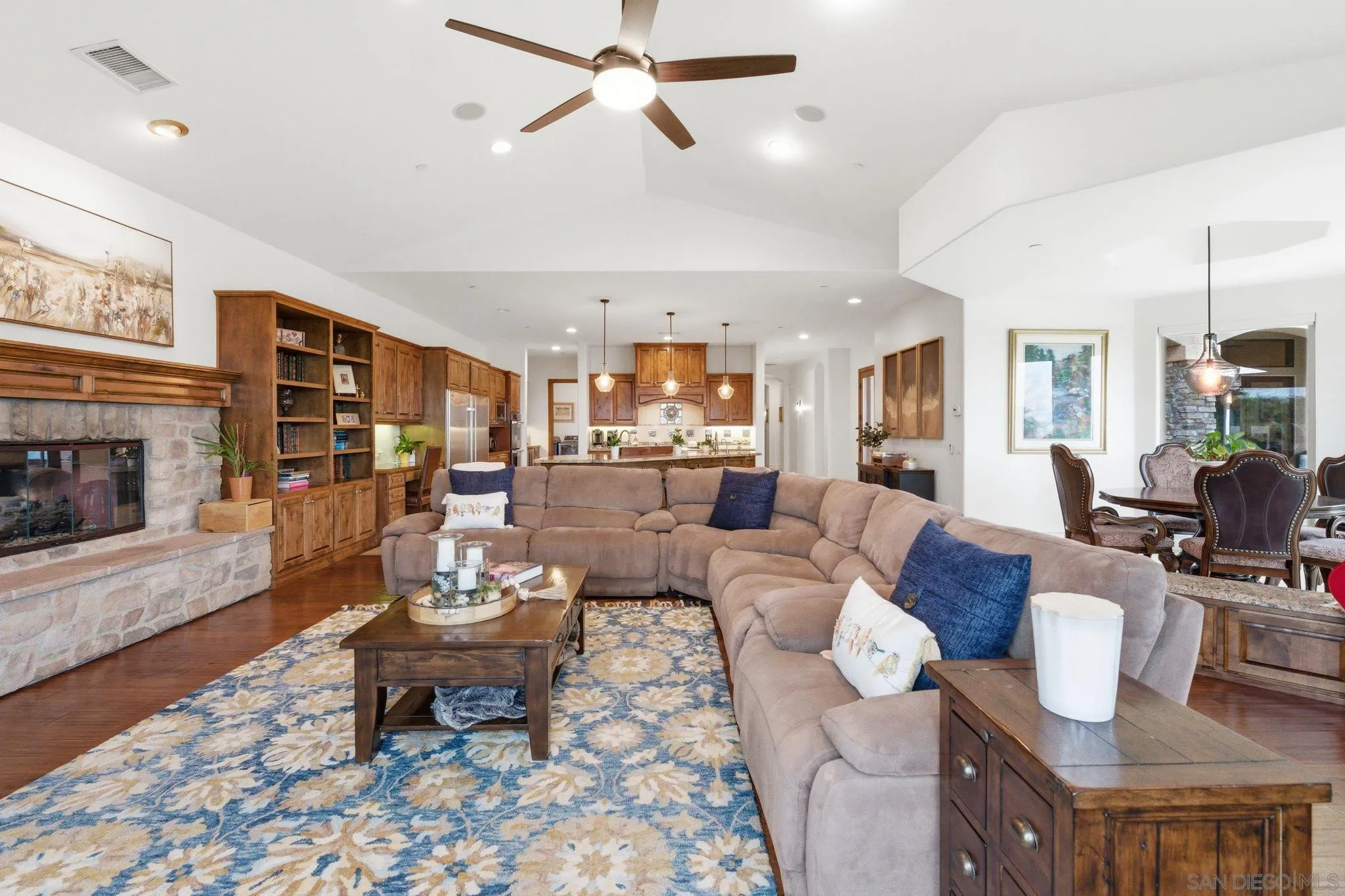 15480 Eastvale Road Poway, CA 92064 - Photo 35 of 71 a living room with furniture and a fireplace
