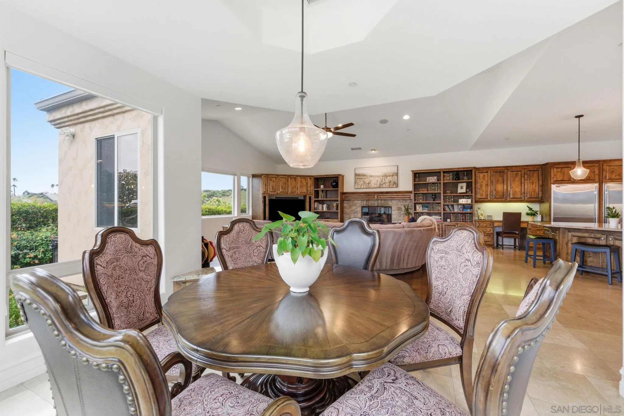 15480 Eastvale Road Poway, CA 92064 - Photo 47 of 71 a view of a dining room with furniture window and wooden floor
