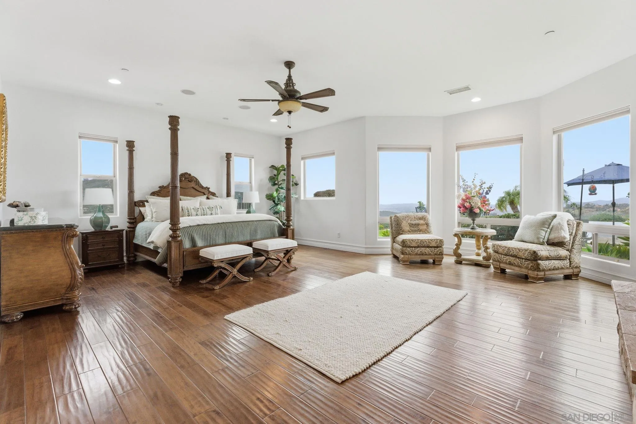 15480 Eastvale Road Poway, CA 92064 - Photo 61 of 71 a living room with furniture and a wooden floor