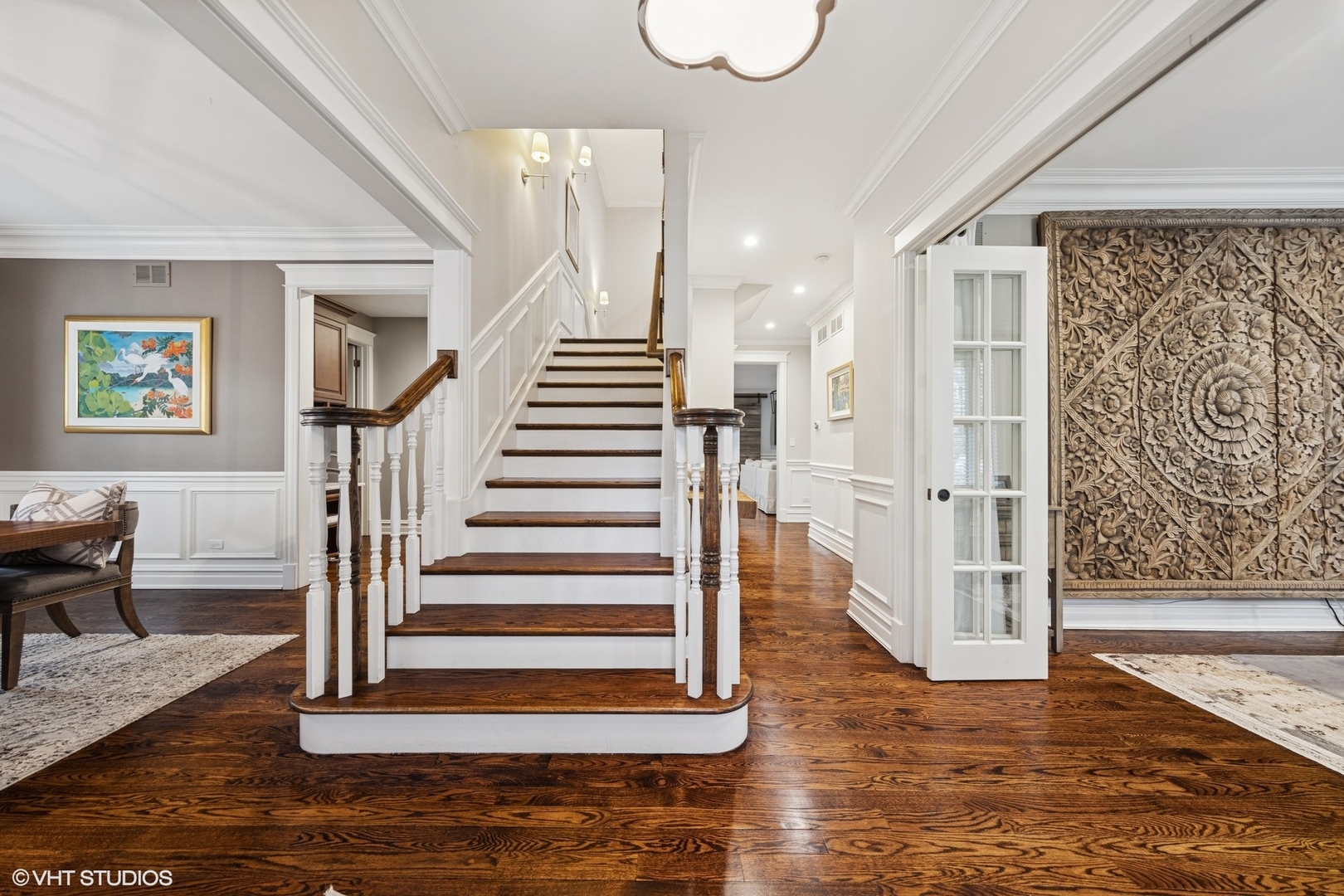 535 Walker Road Hinsdale, IL 60521 - Photo 12 of 29 a view of entryway with wooden floor and stairs