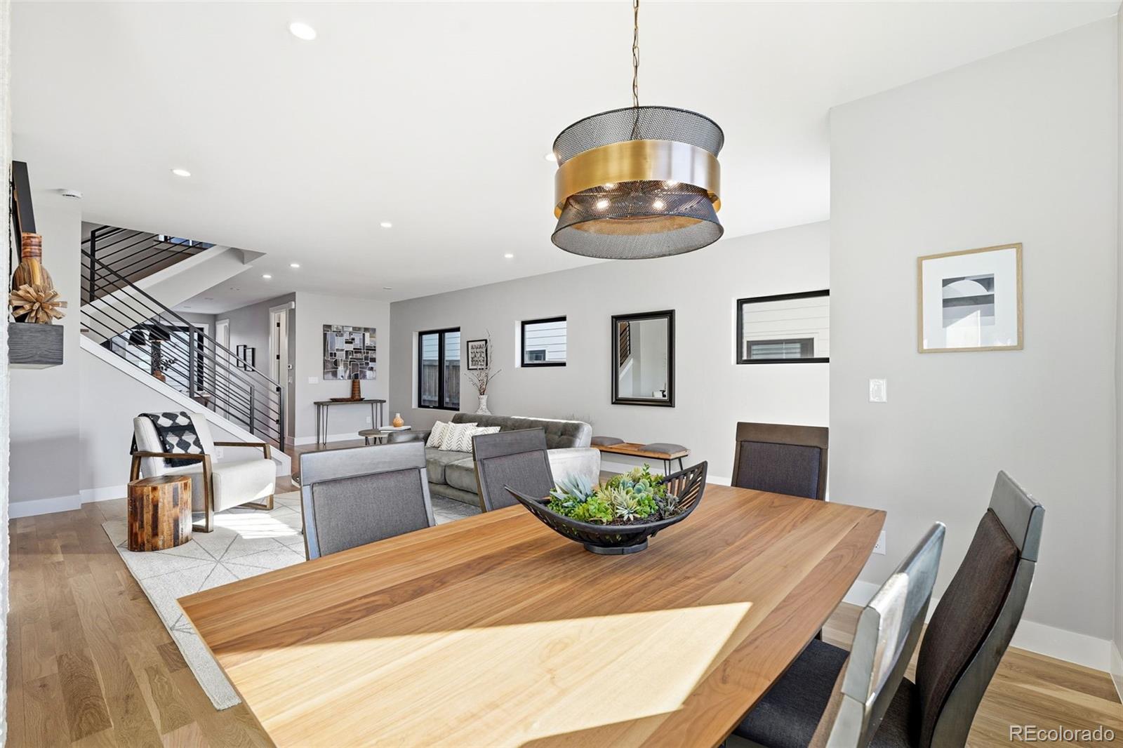 2186 South Sherman Street Denver, CO 80210 - Photo 12 of 44 a view of a dining room with furniture