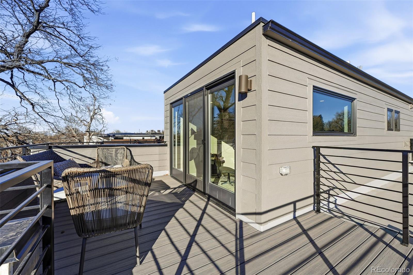 2186 South Sherman Street Denver, CO 80210 - Photo 26 of 44 a view of a balcony with chairs