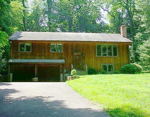 18.5 Vail Road Brookfield, CT 06804 - Photo 1 of 1 a front view of a house with a yard