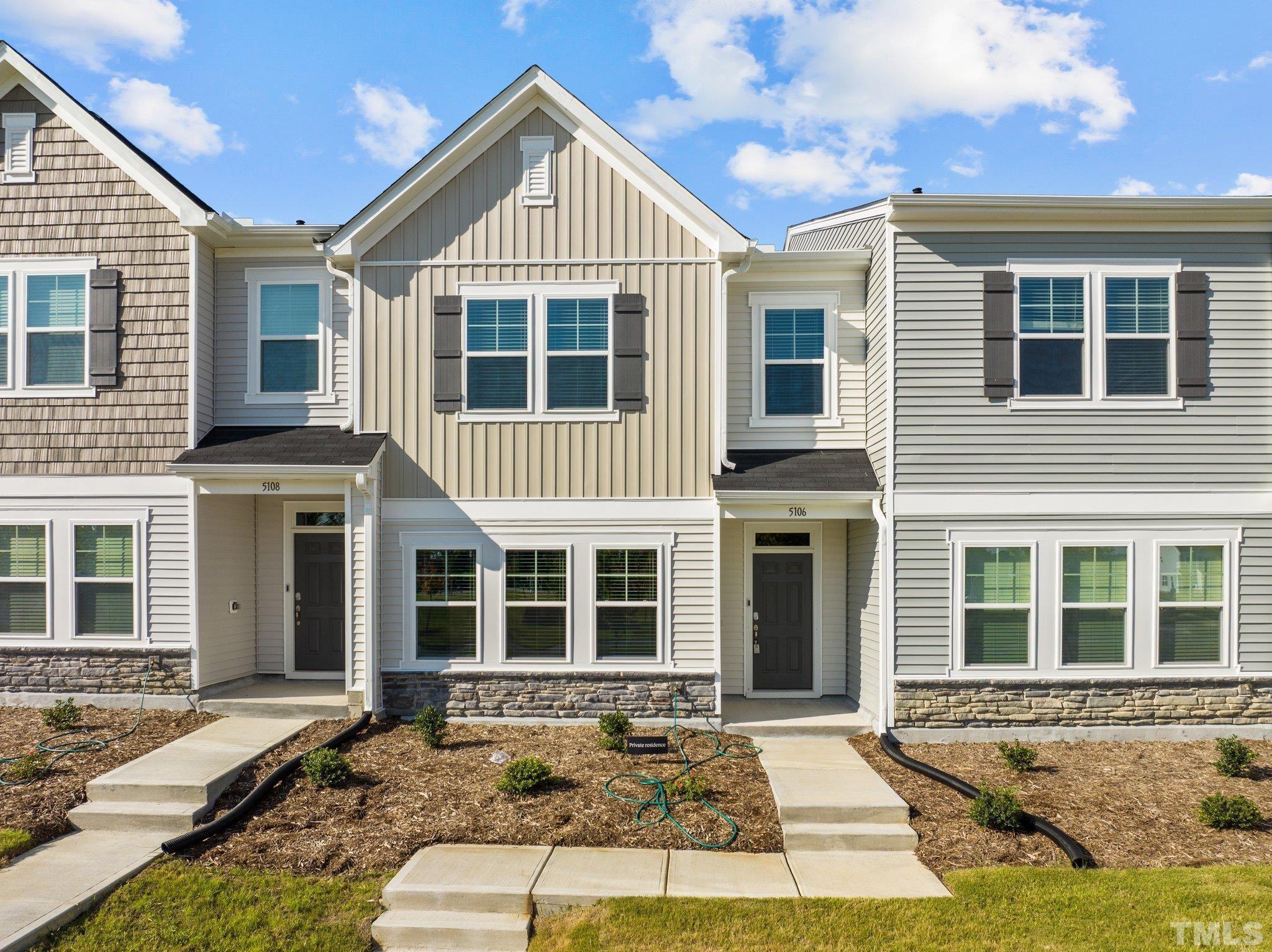 5106 Anamosa Street Raleigh, NC 27610 - Photo 2 of 49 front view of a house with a yard