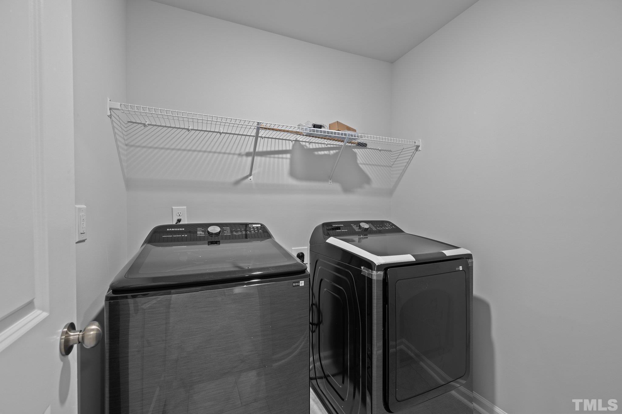 5106 Anamosa Street Raleigh, NC 27610 - Photo 27 of 49 a utility room with dryer and washer