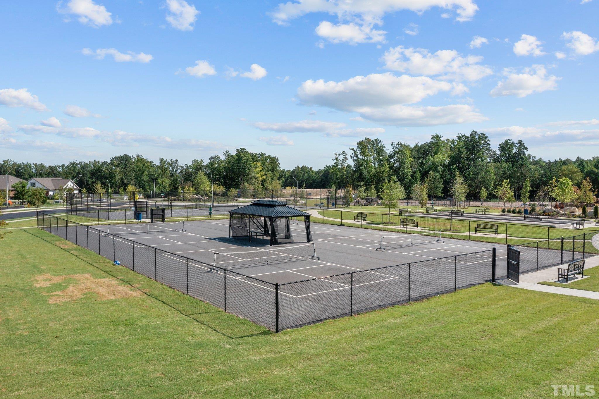 5106 Anamosa Street Raleigh, NC 27610 - Photo 44 of 49 a view of a backyard with a swimming pool
