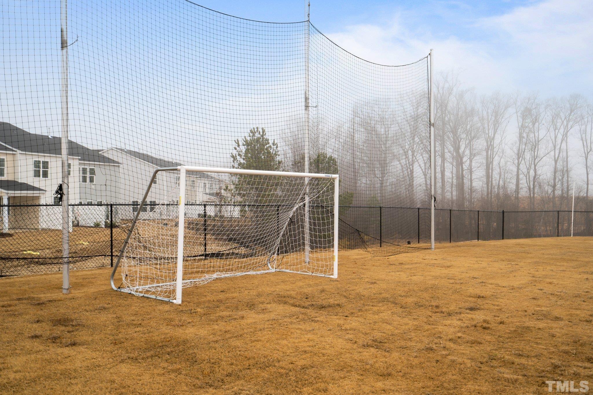 5106 Anamosa Street Raleigh, NC 27610 - Photo 49 of 49 a view of a room with racks on the wall