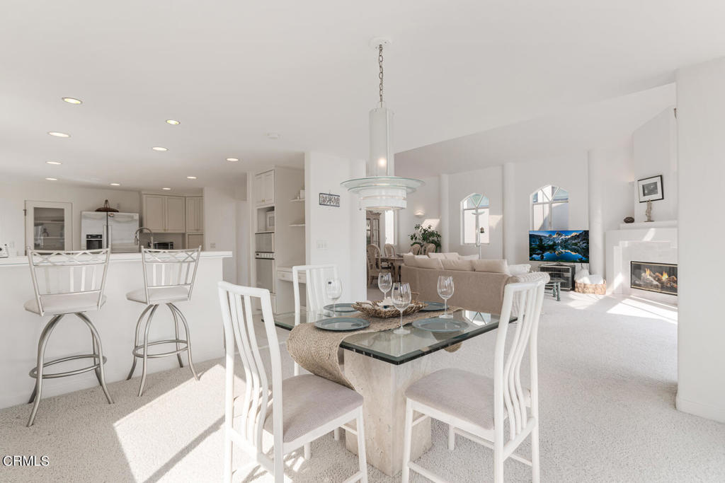 5331 Wavecrest Way Oxnard, CA 93035 - Photo 15 of 60 a dining room with furniture a dining table and chairs