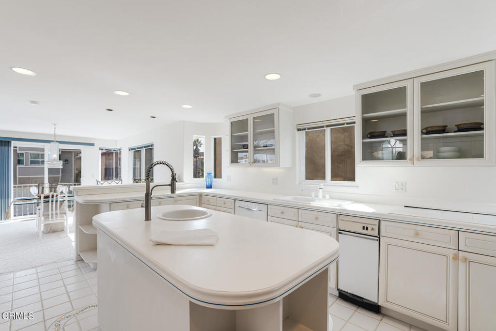 5331 Wavecrest Way Oxnard, CA 93035 - Photo 22 of 60 a kitchen with center island a sink stainless steel appliances and cabinets