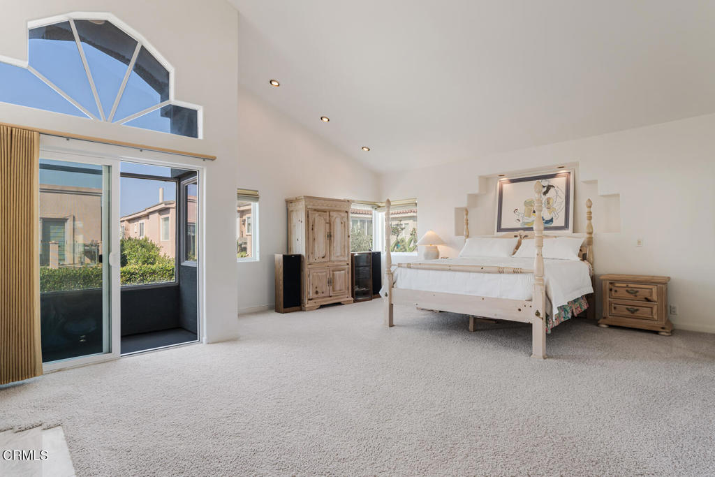 5331 Wavecrest Way Oxnard, CA 93035 - Photo 25 of 60 a bedroom with bed and a large mirror