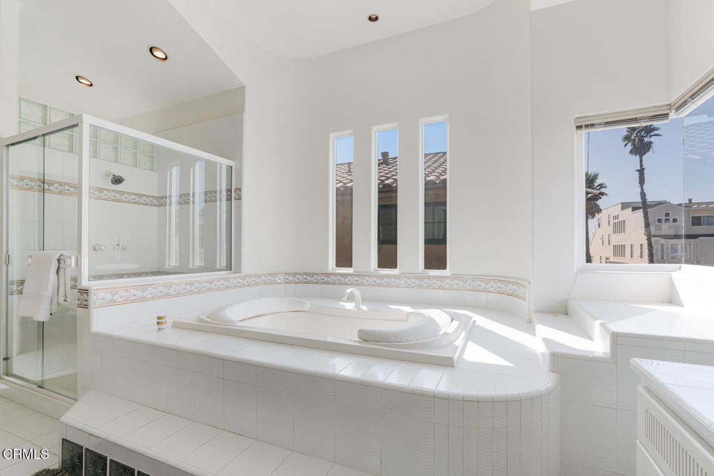 5331 Wavecrest Way Oxnard, CA 93035 - Photo 29 of 60 a bathroom with a bathtub and a sink