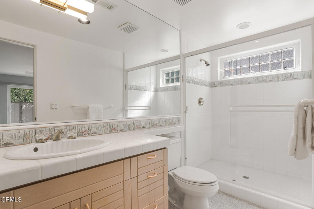 5331 Wavecrest Way Oxnard, CA 93035 - Photo 48 of 60 a bathroom with a sink toilet and shower