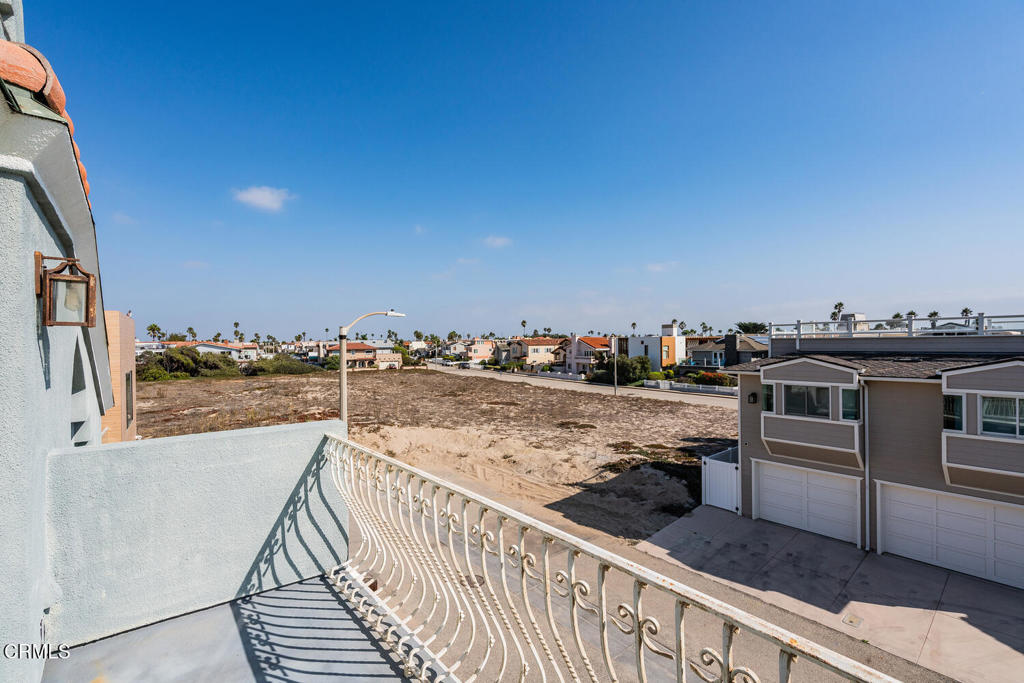 5331 Wavecrest Way Oxnard, CA 93035 - Photo 53 of 60 a view of roof deck with two chairs and wooden floor
