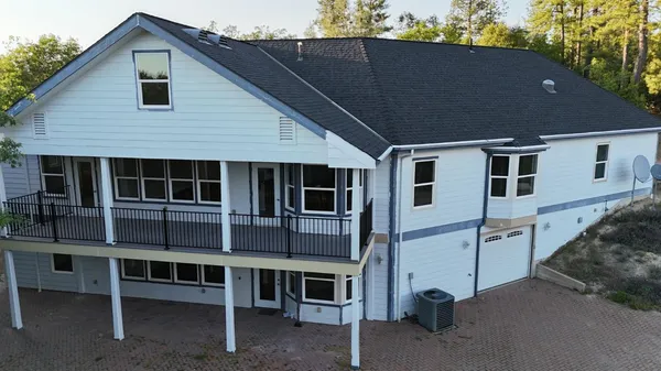 a front view of a house with a balcony