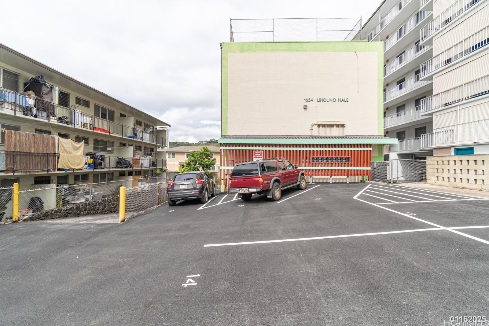 1654 Liholiho Street, Unit 9 Honolulu, HI 96822 - Photo 1 of 16 a view of a street with cars