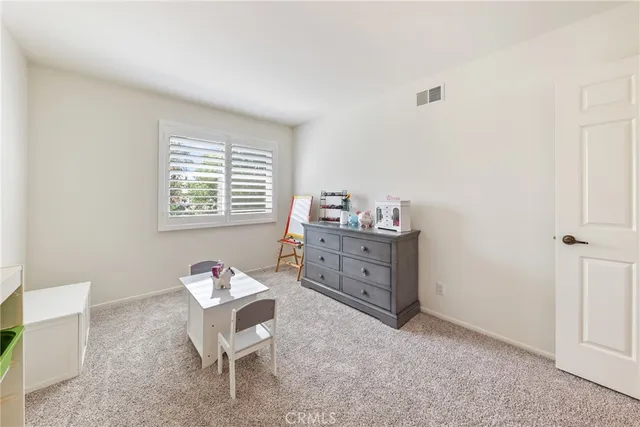 a room with furniture and window