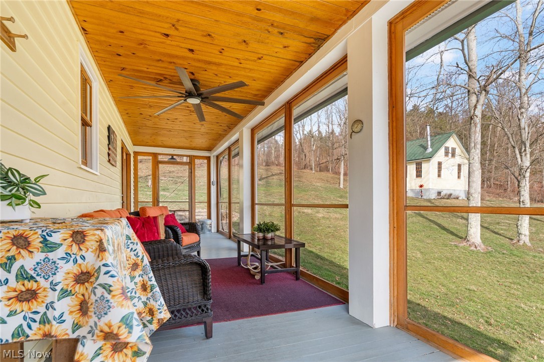 2210 Scroll Road Southwest Carrollton, OH 44615 - Photo 24 of 48 Screened in seasonal porch