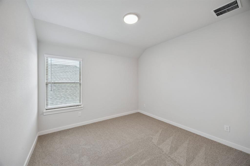 1472 Companero Street Haslet, TX 76052 - Photo 29 of 40 an empty room with a window