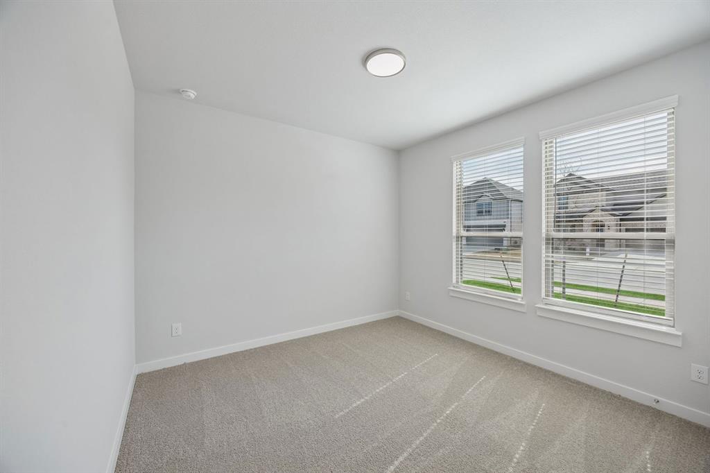 1472 Companero Street Haslet, TX 76052 - Photo 31 of 40 an empty room with a window