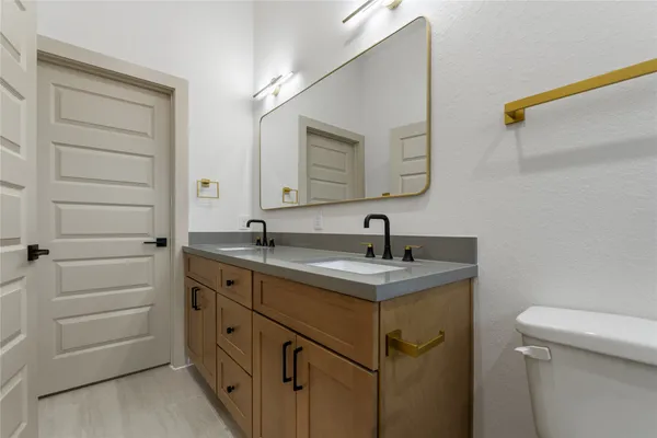 a bathroom with a sink and a toilet