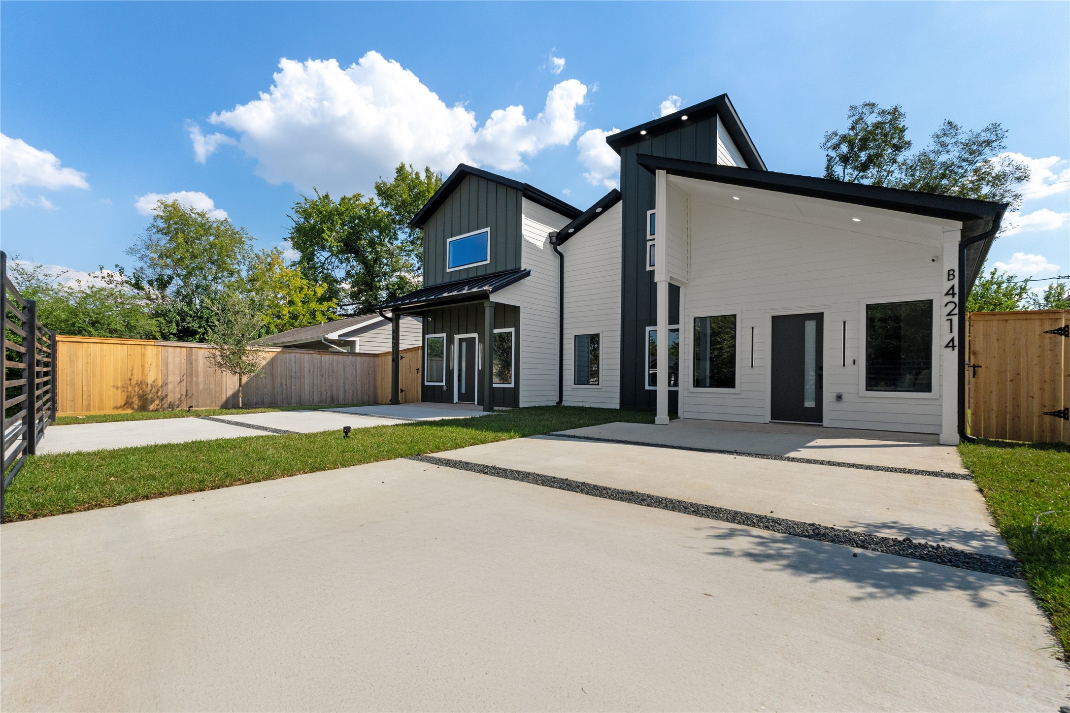 4214 Clover Street Houston, TX 77051 - Photo 5 of 25 a view of a house with a yard and garage