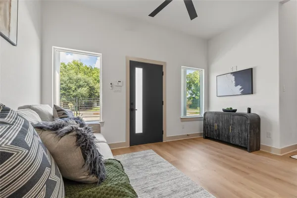 a bedroom with furniture and a window